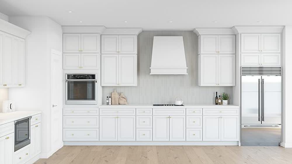 Aspen White kitchen cabinets shown in a finished kitchen — white raised-panel doors