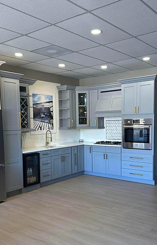 L-shaped kitchen display at the Cabinet Bazaar showroom on Bandera Rd, San Antonio