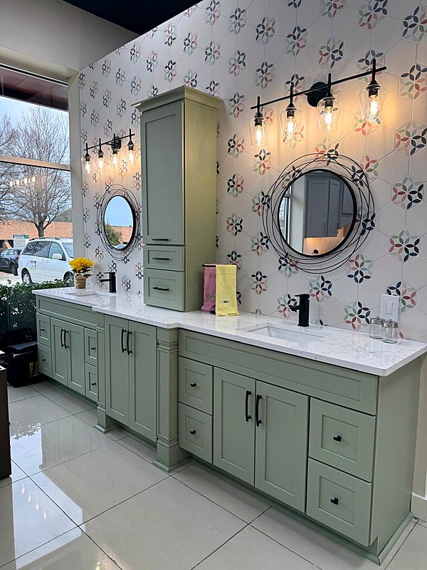 Sage green double bathroom vanity with round mirrors and quartz top