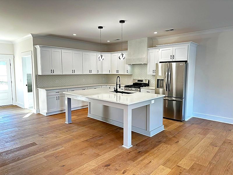 White shaker + stainless — Cabinet Bazaar San Antonio